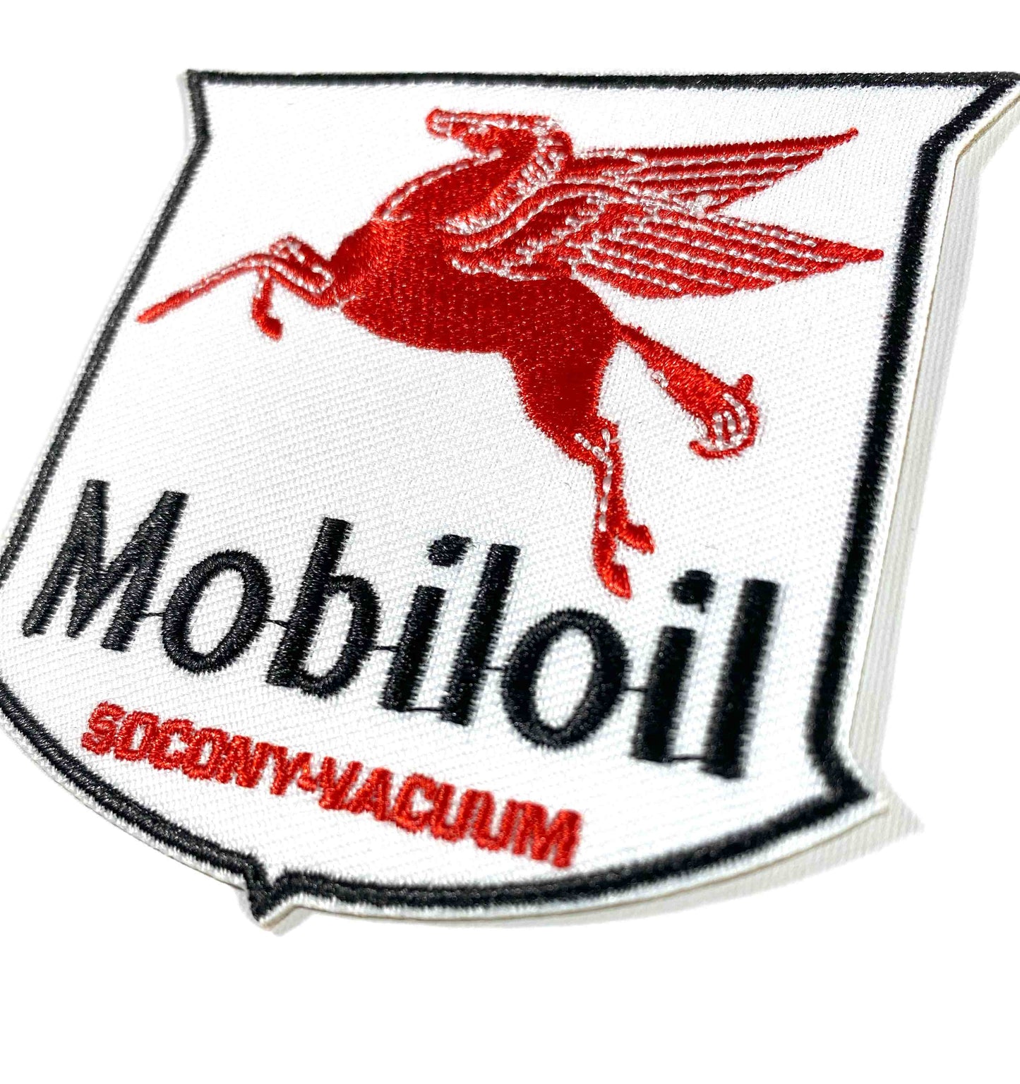 Tygmärke Mobiloil Sköld