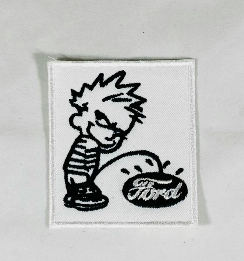 Tygmärke Kalle pissar på Ford