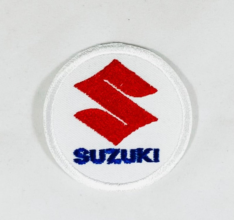 Tygmärke Suzuki