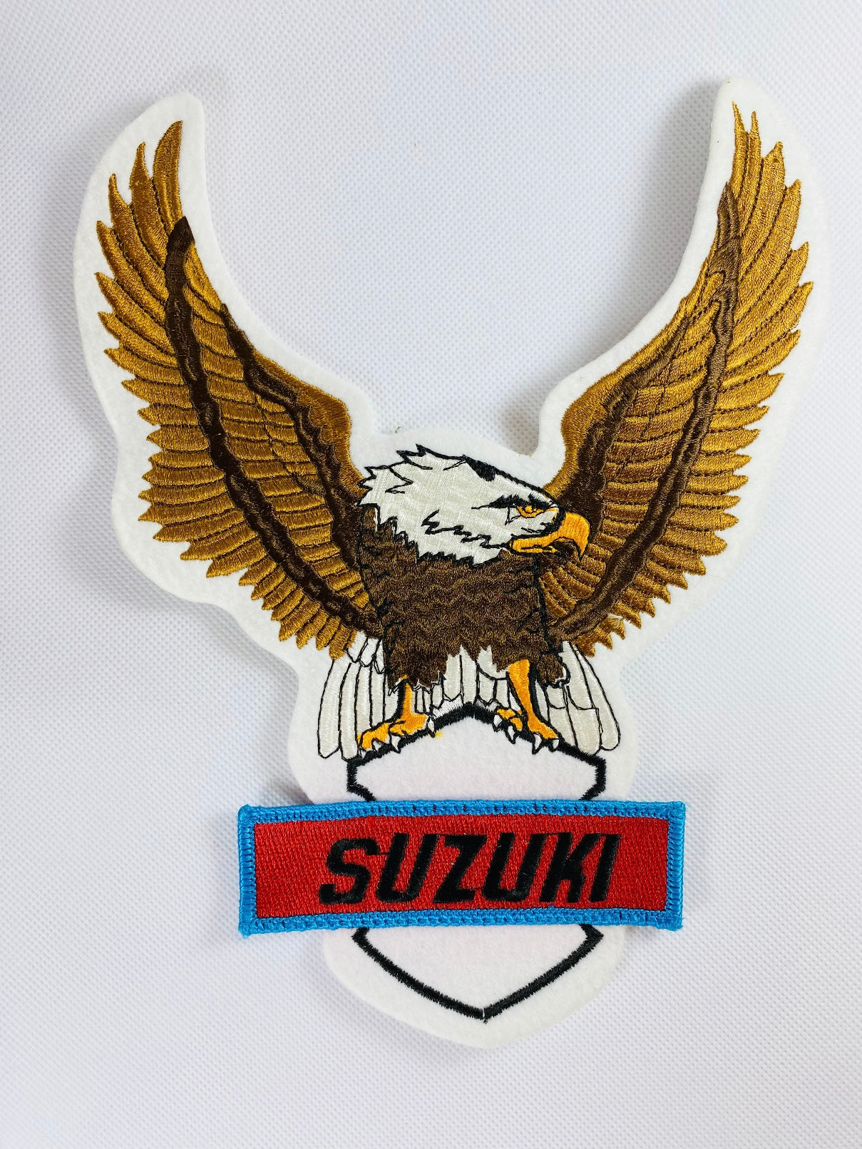 Tygmärke Suzuki Ryggmärke